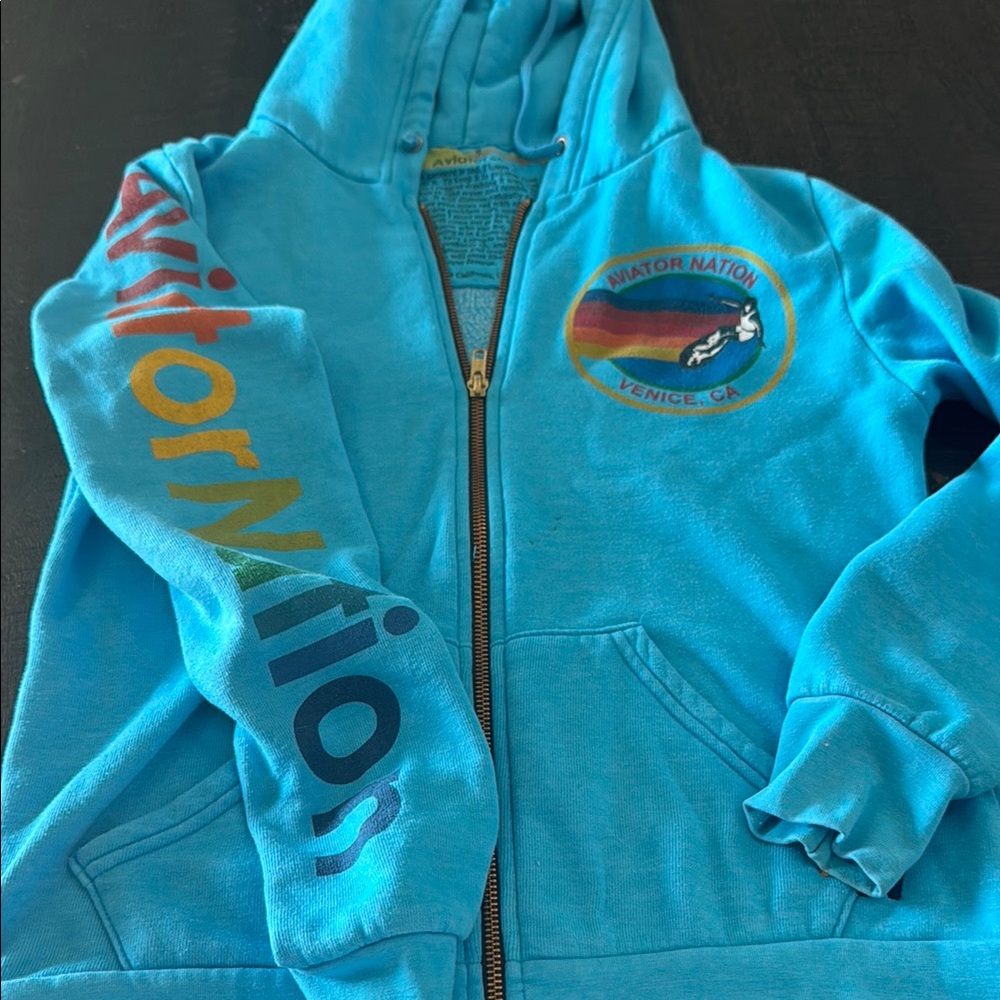 Aviator Nation Blue Sweatshirt with Vibrant Sleeve Design